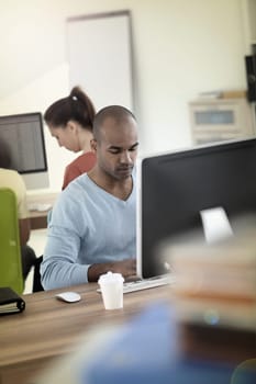 Man working on desktop computer