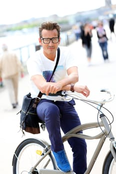 Man riding bicycle in Bordeaux