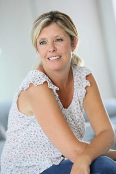 Beautiful 40-year old woman at home