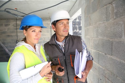 Construction workers on building site