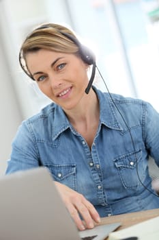 Active woman teleworking from home