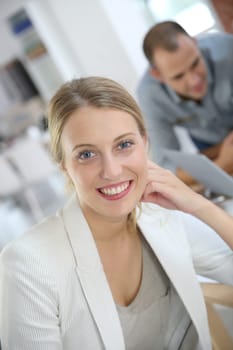 Portrait of young woman in office