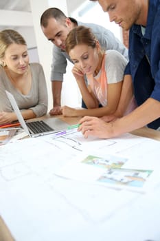 Young team of students working on project