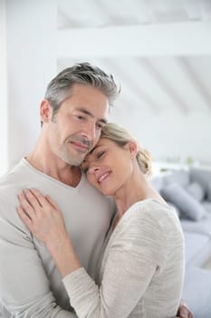 Portrait of loving mature couple