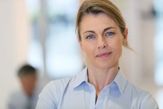 Portrait of mature blond businesswoman