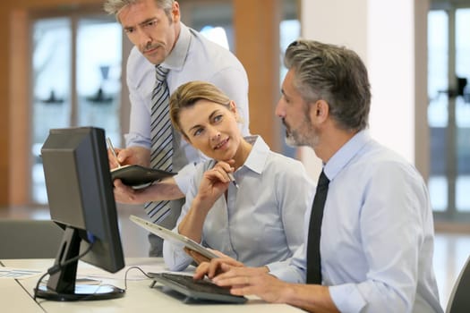Business team working on project in office