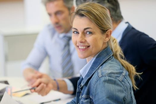 Portrait of businesswoman meeting in office