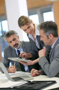 Business partners working together in office
