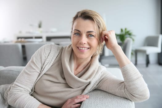 Portrait of mature smiling blond woman