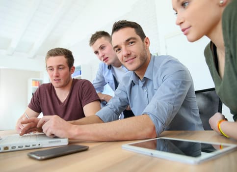 Group of young people in business training
