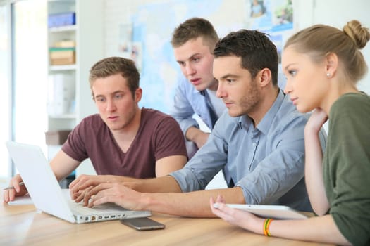 Group of young people in business training