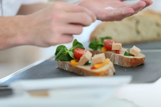 Closeup of delicatessen dish being prepared