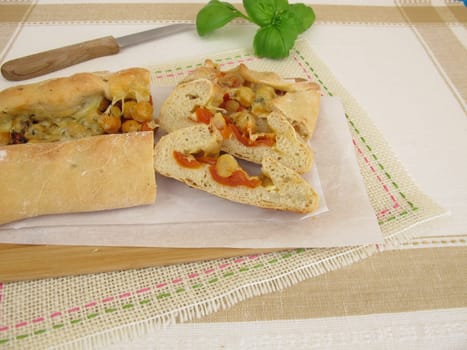 Hand bread filled with chickpeas,tomatoes and cheese
