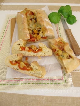 Hand bread filled with chickpeas,tomatoes and cheese