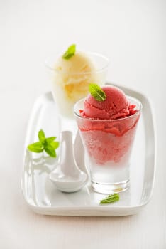 Fresh fruit sorbet ice cream on white background.