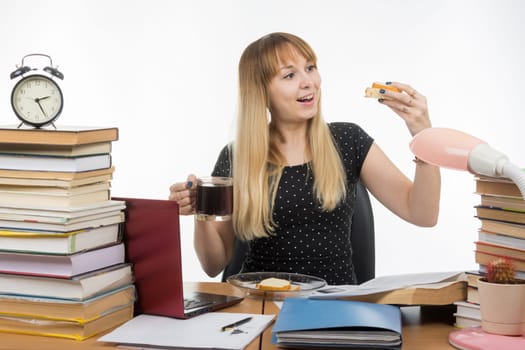 Hungry young teacher very happy sandwich with coffee