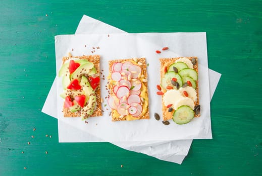 Knaeckebrot with colorful spread and topping
