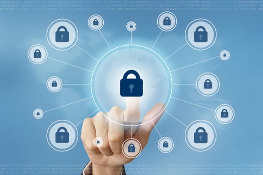 business hand pushing security button with global networking concept