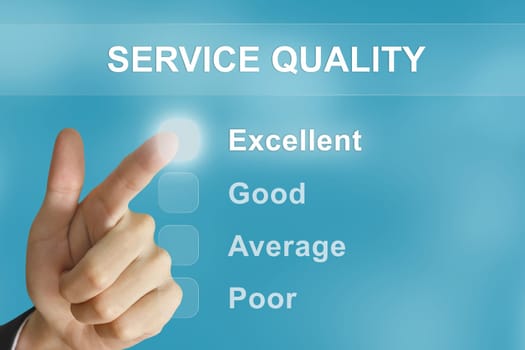 business hand clicking service quality button on screen