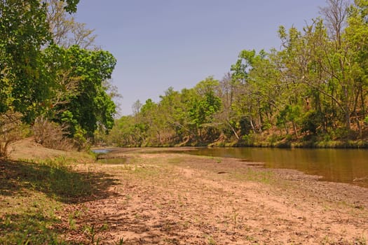 Burburi river at Low Water in by Kanha National Park in India