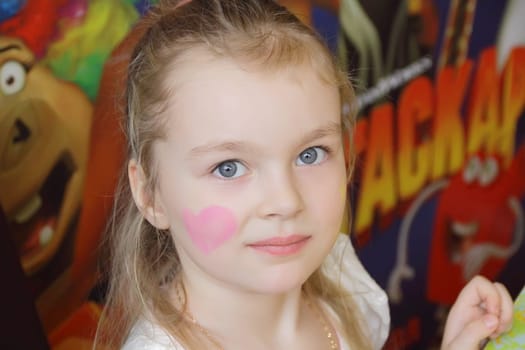 Portrait of beautiful girl with blue eyes