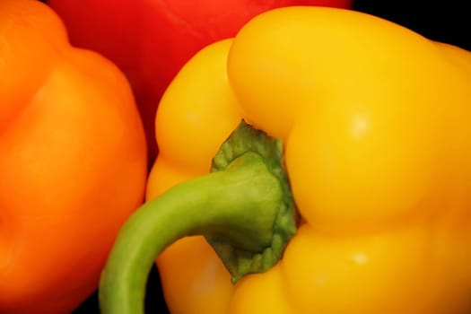 Image of red and yellow raw pepper