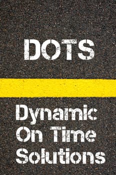 Concept image of Business Acronym DOTS Dynamic On Time Solutions written over road marking yellow paint line
