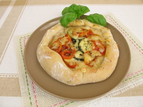 Hand bread pizza with tomatoes,cucumber and cheese