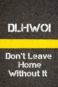 Concept image of Business Acronym DLHWOI Don&#39 t Leave Home Without It written over road marking yellow paint line