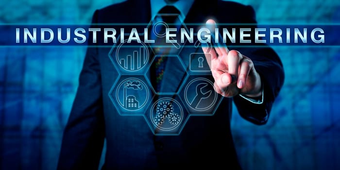 Manager touching INDUSTRIAL ENGINEERING on a visual interactive control screen. Production and manufacturing metaphor. Business and industrial concept for managing process and systems optimization.