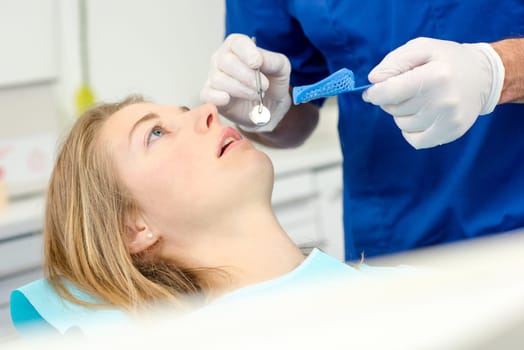 About to have her teeth moulded