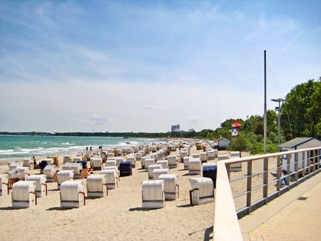 Timmendorfer Strand, Germany - May 23, 2008: View over beach of Timmendorfer Strand with beach chairs from promenade.