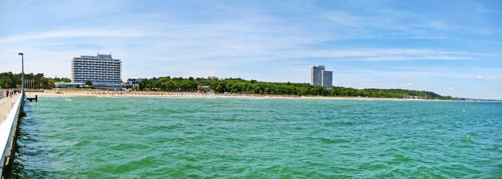 Timmendorfer Strand, Germany - May 23, 2008: Beach in Timmendorfer Strand with Maritim Hotel - beach chairs at baltic sea, view from pier.