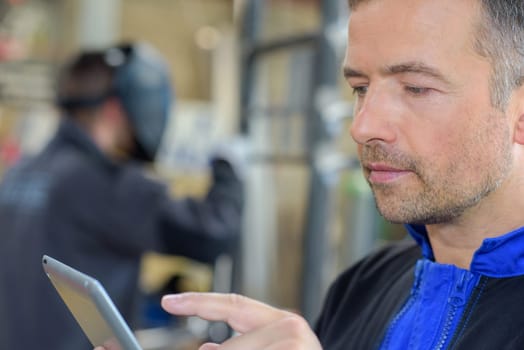 Man using tablet computer