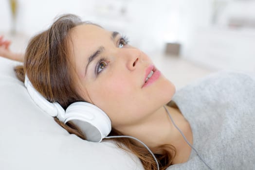 Escaping the world thanks to her headphones