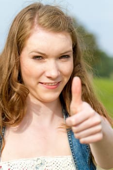 Teenagers with thumbs up