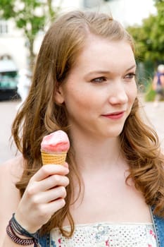 Young woman eating ice cream