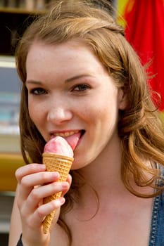 Young woman eating ice cream