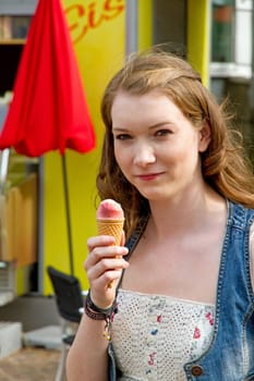 Young woman eating ice cream