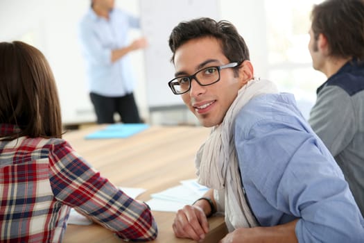 Portrait of student in conference room