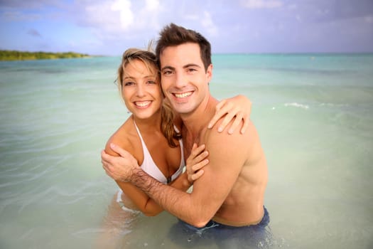 Couple enjoying bath in tropical water