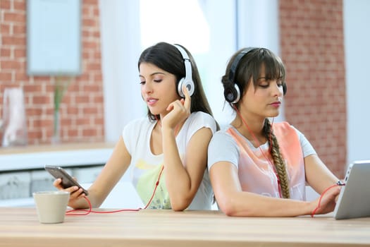 Girl friends connected each one with a different support