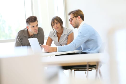 Business people working together in meeting room
