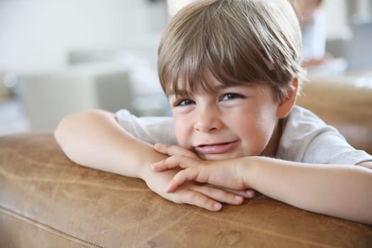 Portrait of cute little boy looking at camera