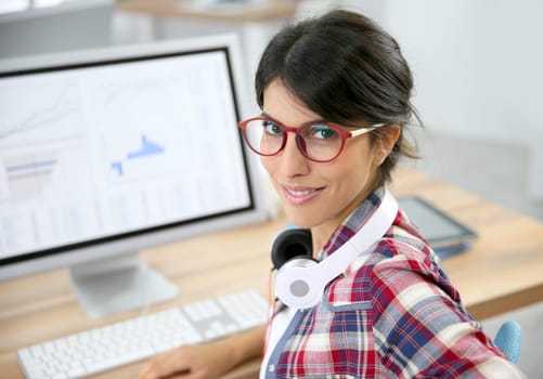 Portrait of office worker with eyeglasses on