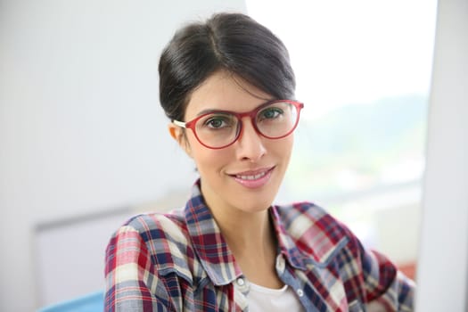 Portrait of office worker with eyeglasses on