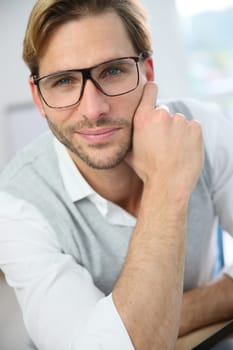 Portrait of handsome man with eyeglasses on
