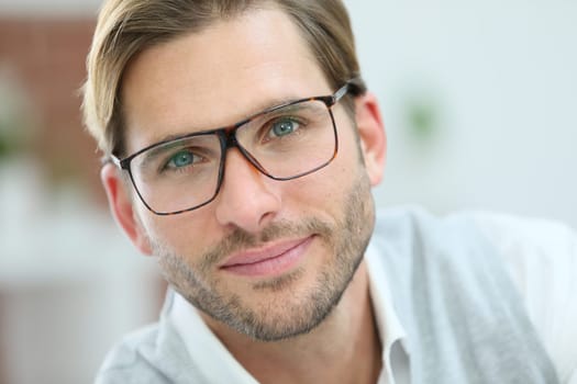 Portrait of handsome man with eyeglasses on