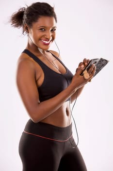 young black woman wearing fitness outfit on white isolated background