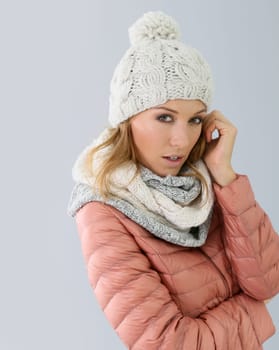 Woman model with winter outfit, isolated